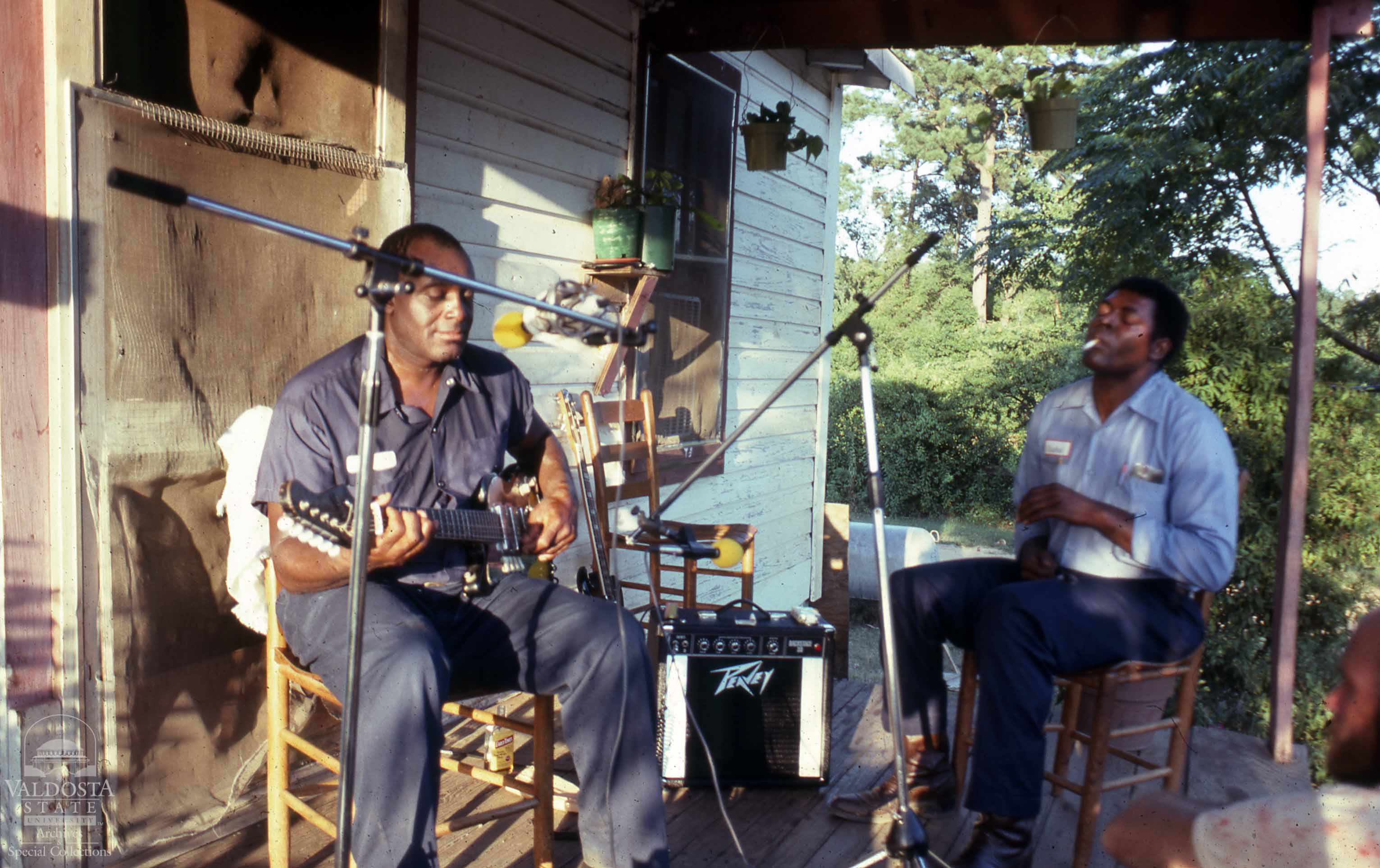 Bluesmen jamming on a porch. Dennis Coelho Photographs, 1976