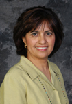 A young woman in a green shirt.