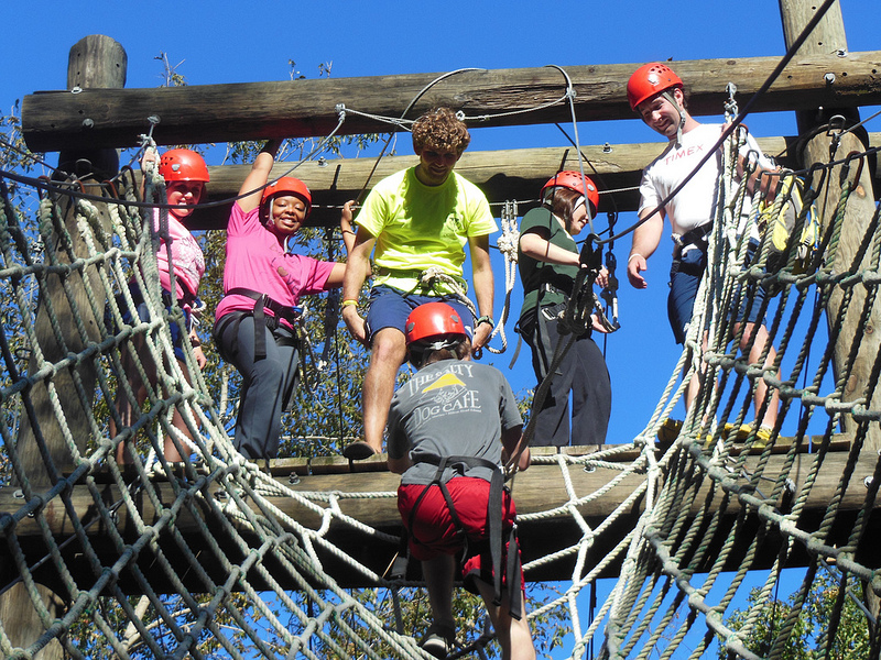 HESA students completing a ropes course.