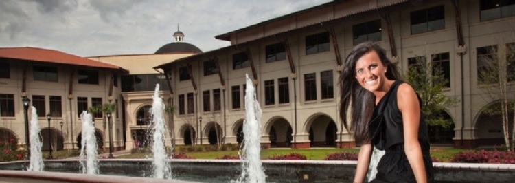 Student in front of Student Union Building